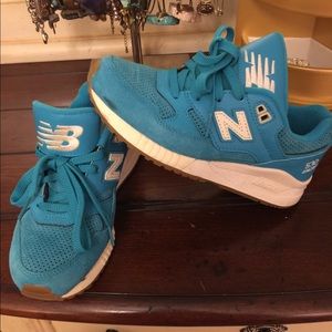 Turquoise suede New Balance sneakers